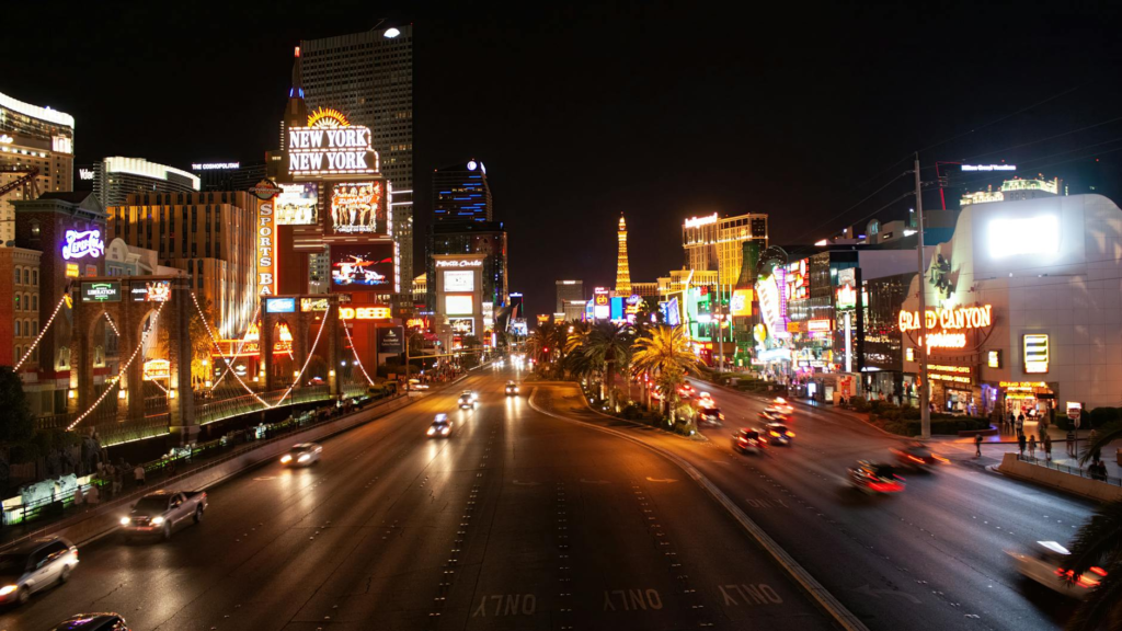 A bustling Las Vegas street with popular burger joints in the background — best burgers in Las Vegas