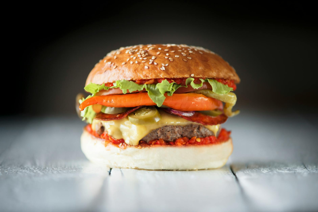 A close-up of a burger showcasing its spicy ingredients — spicy burgers Las Vegas