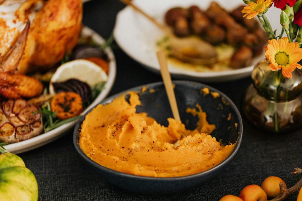 A colorful array of holiday burger toppings including sweet potato mash and spiced apples. — Holiday Burger Toppings Las…