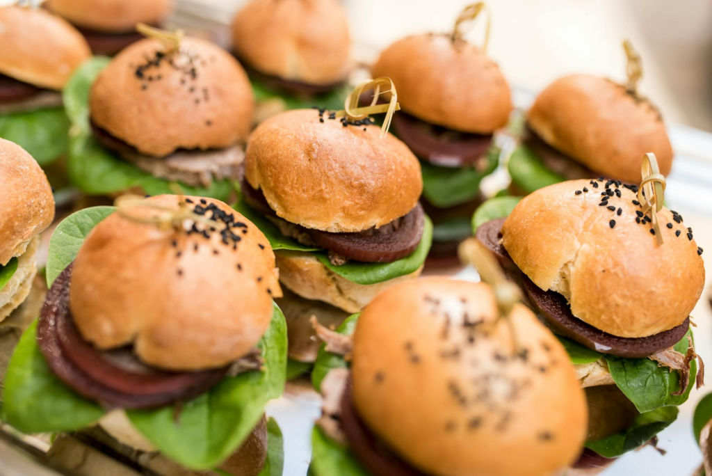 A colorful assortment of vegan burgers on a platter, ready to be served. — vegan burgers Las Vegas