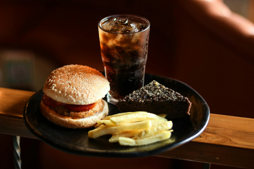 A colorful plate of kid-friendly burgers served with fries and a drink. — kid-friendly burgers Las Vegas