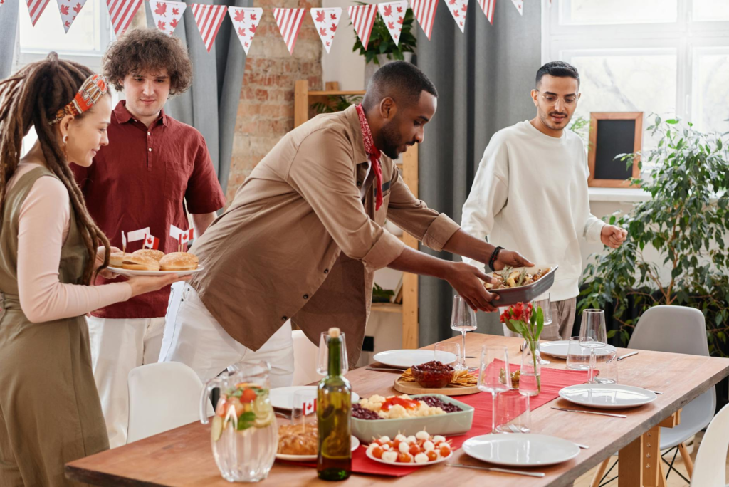 A family gathered around a table enjoying homemade holiday burgers. — Holiday Burger Recipes Las Vegas