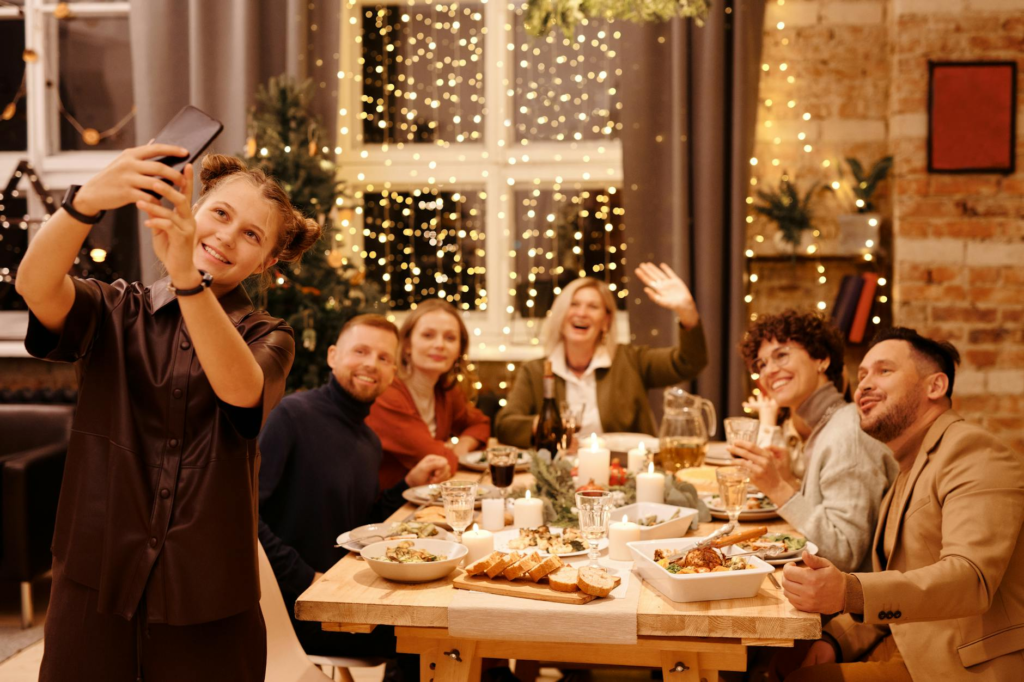 A family taking a selfie while enjoying their meal at a popular burger place. — family-friendly burgers Las Vegas