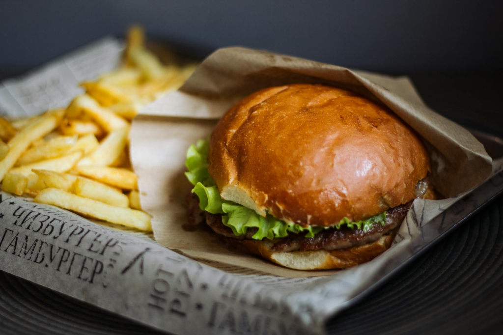 A mouth-watering cheeseburger with a side of fries and a milkshake. — burger combos Las Vegas