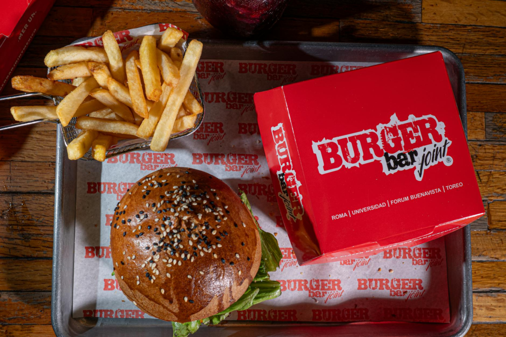 A mouth-watering gourmet burger served with fries at Burger Bar. — gourmet burgers Las Vegas