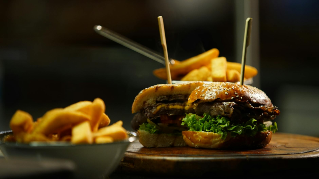 A mouthwatering cheeseburger with a side of fries from a local Las Vegas burger joint. — off strip burgers Las Vegas