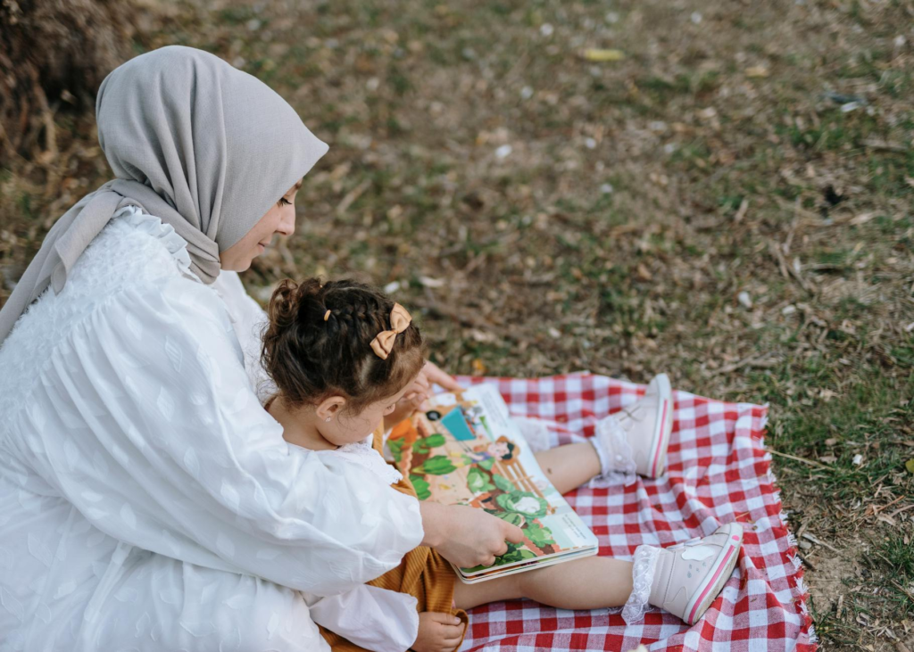 A parent and child sharing a burger, highlighting the bonding experience. — family-friendly burgers Las Vegas