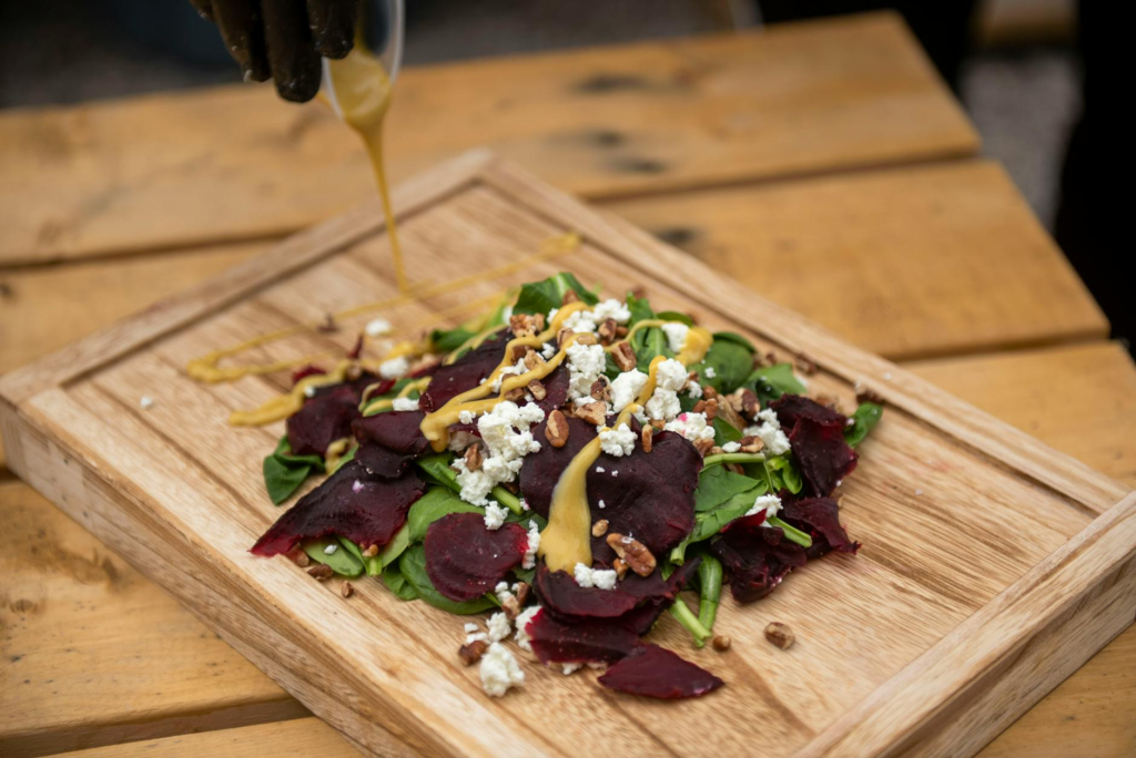 A vibrant salad served as a side dish, perfect for pairing with a hearty burger. — burger side dishes Las Vegas