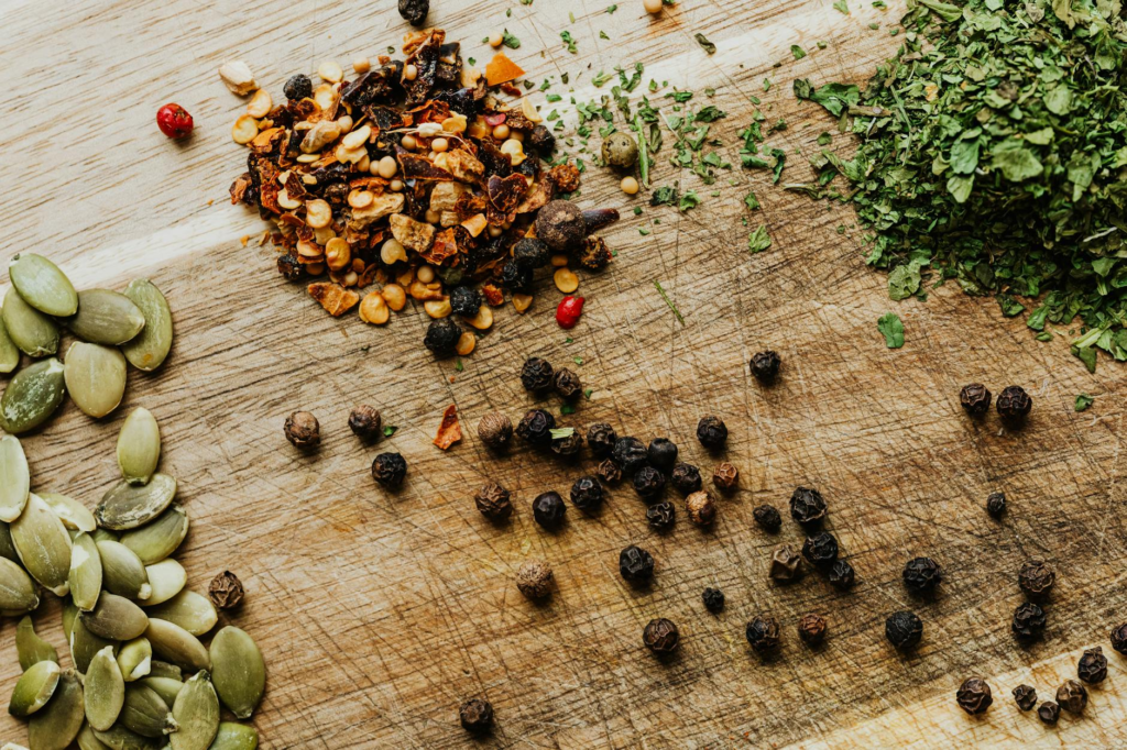 An arrangement of festive burger ingredients, including fresh herbs and spices. — Holiday Burger Recipes Las Vegas