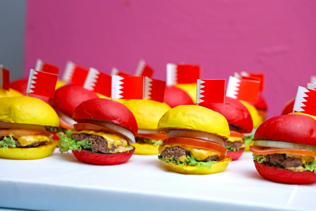 An array of gourmet burgers garnished with unique ingredients like truffle oil. — Holiday Burger Trends Las Vegas