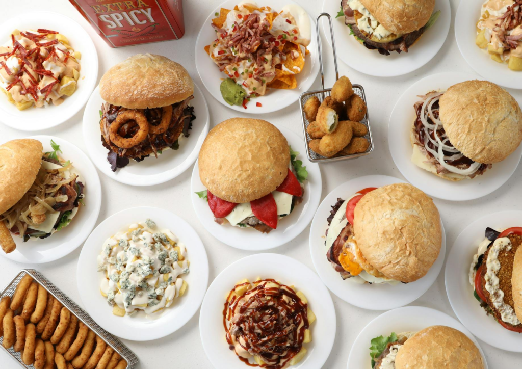 An enticing view of a burger platter featuring a variety of sides at a top Las Vegas eatery. — burger side dishes Las Vegas