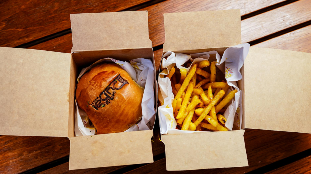 An overhead shot of a truffle burger with fries at Umami Burger. — gourmet burgers Las Vegas