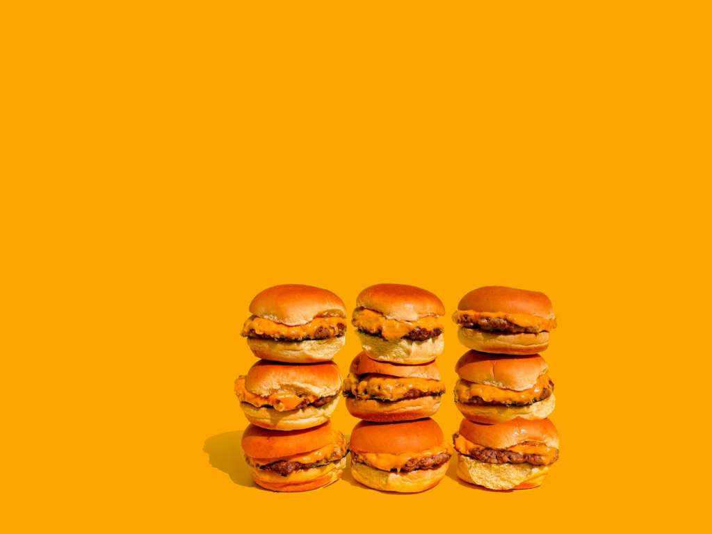 Cheeseburger sliders stacked high at a popular Las Vegas restaurant — cheeseburger slider challenges Las Vegas