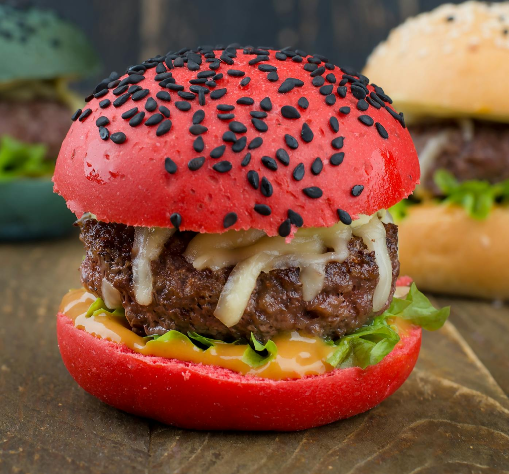 Close-up of a gourmet burger with fresh ingredients, showcasing the culinary creativity at the festival. — Las Vegas bur…