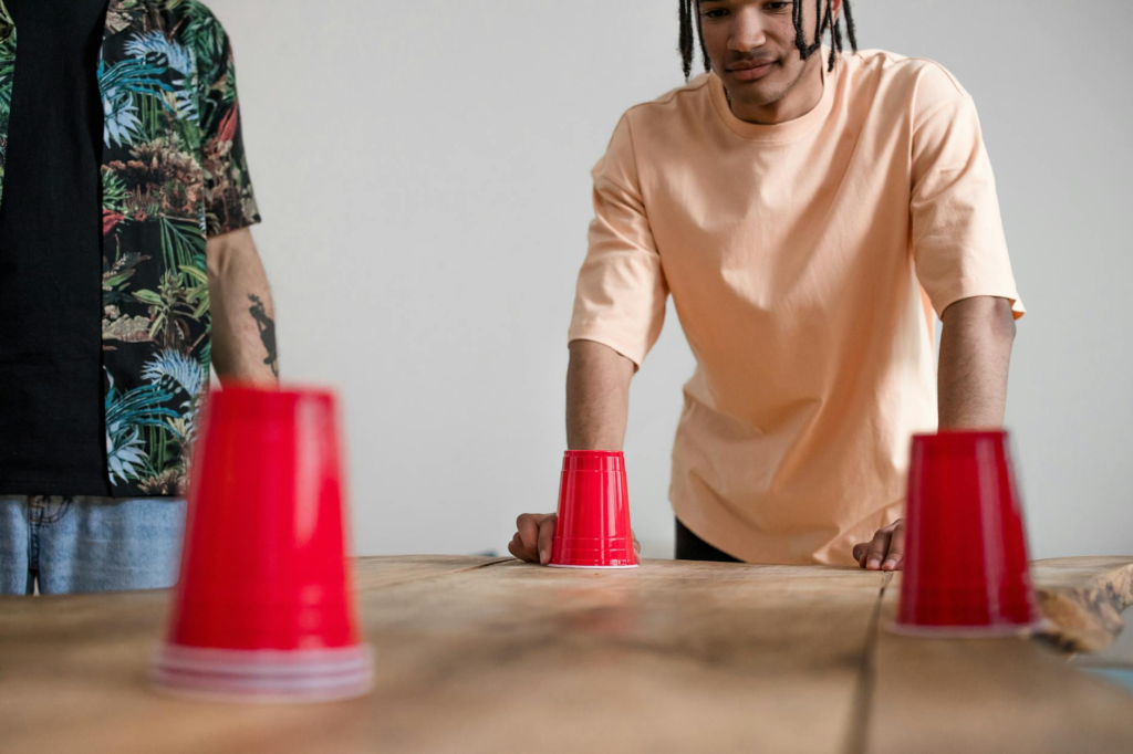 Guests enjoying a slider party, engaging in games and activities. — DIY cheeseburger slider kits