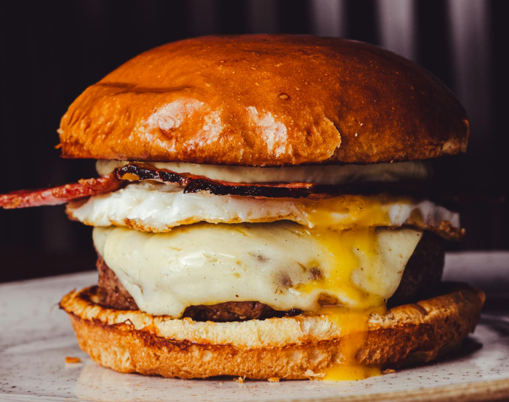 A mouth-watering close-up of a gourmet burger from Gordon Ramsay Burger. — best burgers Las Vegas Strip