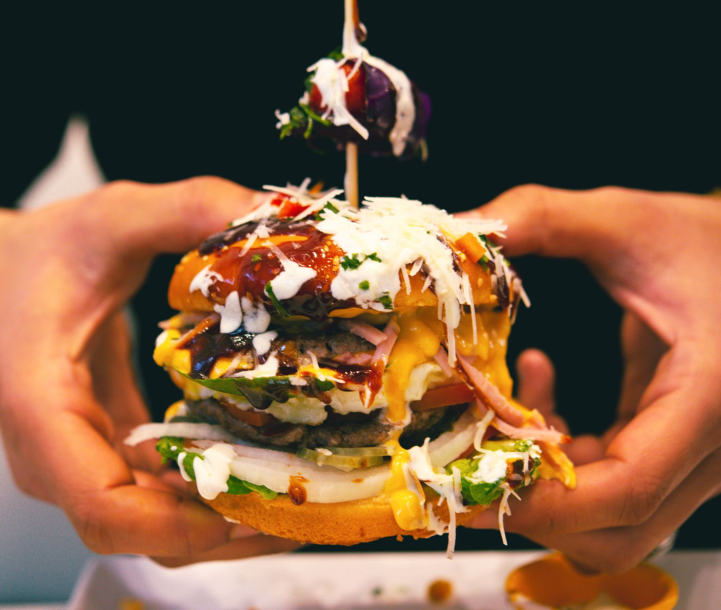 A close-up of a gourmet burger with unique toppings, perfect for late-night cravings — late-night burgers Las Vegas