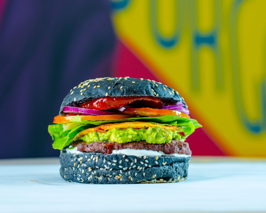 A close-up of a plant-based burger to highlight vegan options available in Henderson. — best burgers henderson nv