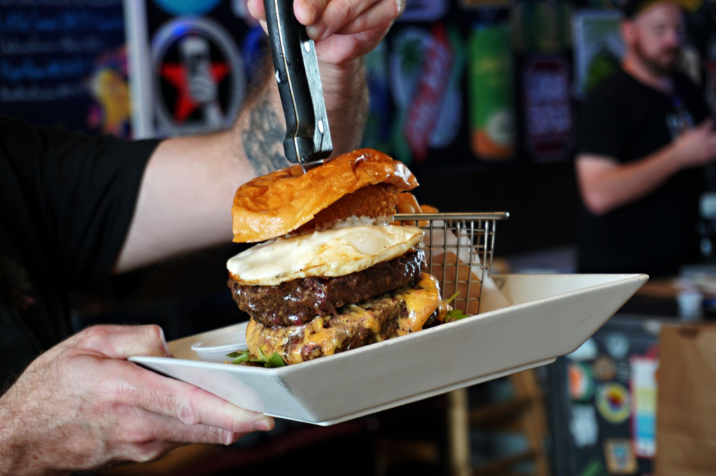 A collage of various burger discounts available at different Las Vegas establishments — burger deals Las Vegas