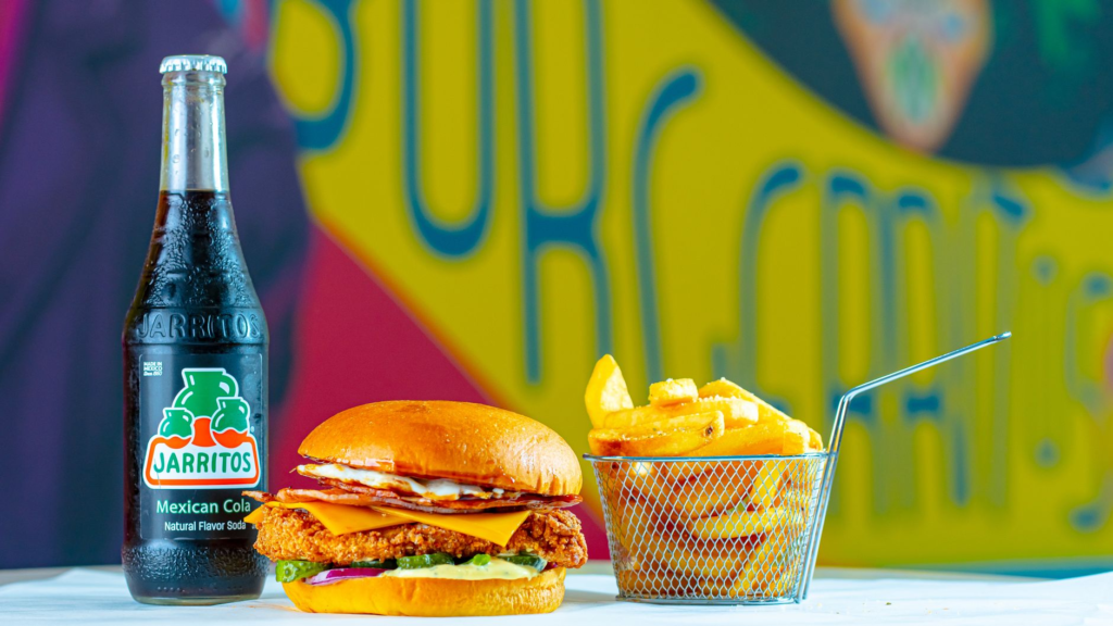 A delicious burger with a side of crispy fries and a refreshing drink. — burger and drink pairings Las Vegas