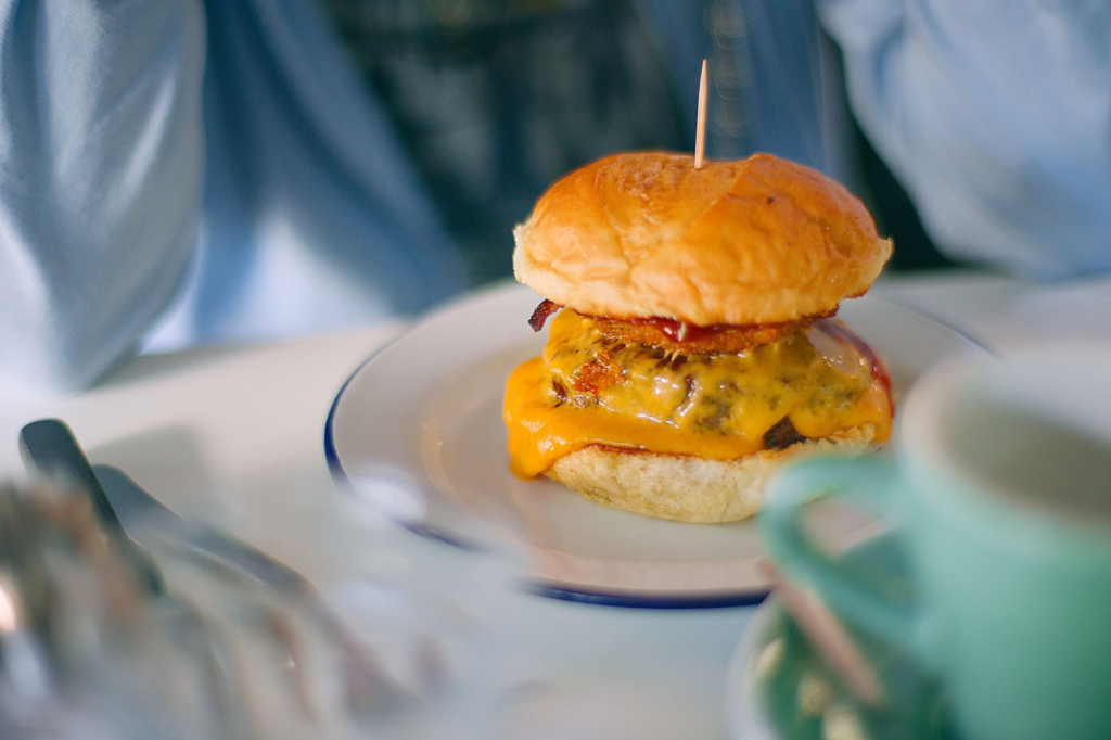 A family enjoying burgers at a cozy restaurant in Las Vegas. — family-friendly burgers Las Vegas