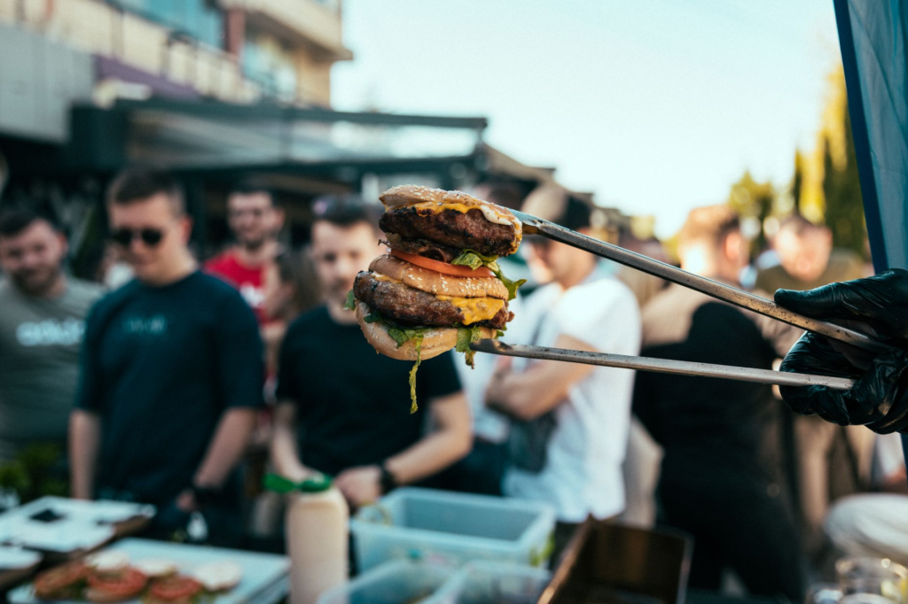A fun burger festival in Las Vegas with food stalls, crowds, and burger enthusiasts. — local best burgers Las Vegas