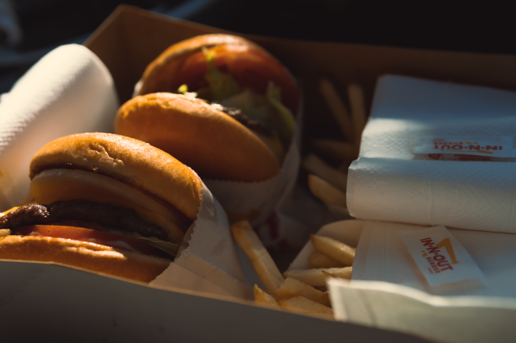 A mouth-watering In-N-Out Burger with fries, showcasing a classic Vegas dining experience. — burgers near las vegas airport