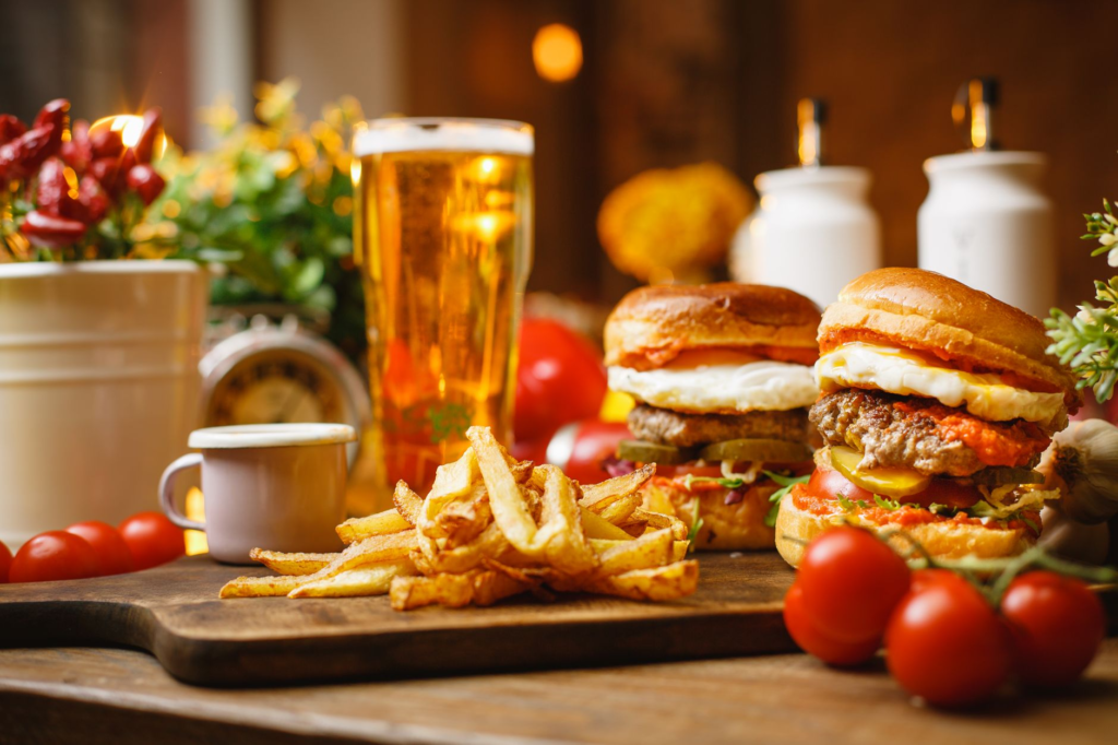 A mouthwatering burger with a pint of craft beer in a Las Vegas bar. — burgers and beer Las Vegas