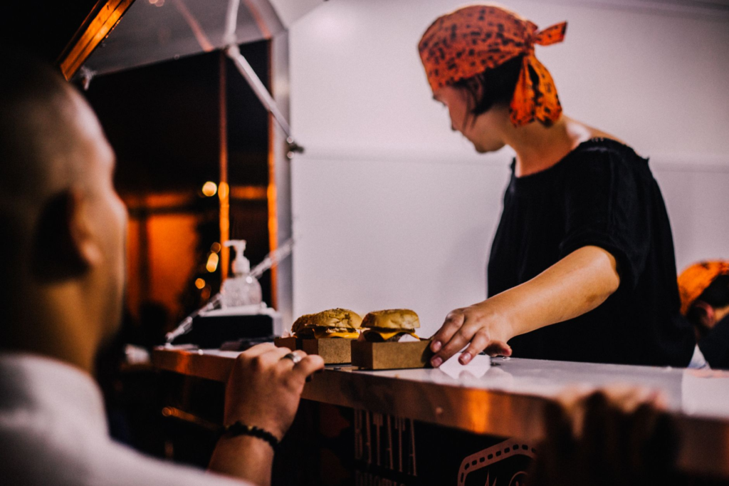 A snapshot of a local food truck serving delicious burgers at an outdoor event in Las Vegas. — cheap burgers las vegas