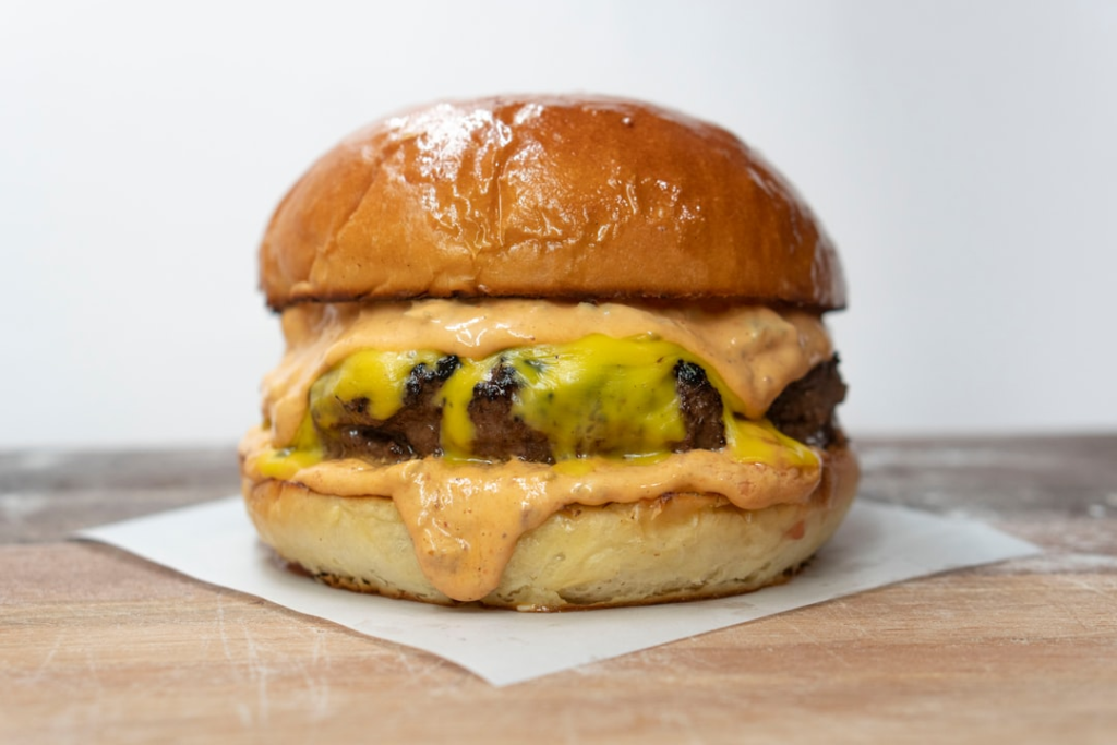 A spicy jalapeño burger topped with fresh jalapeños and sauces, capturing the heat and flavor. — best burgers in Las V…