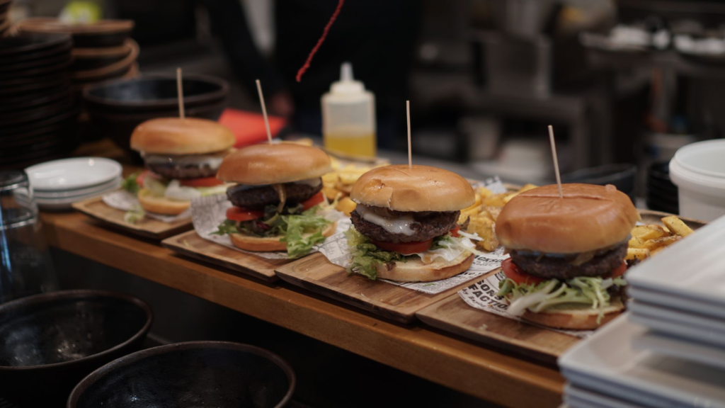 An enticing loaded burger topped with unique ingredients — late-night burgers Las Vegas