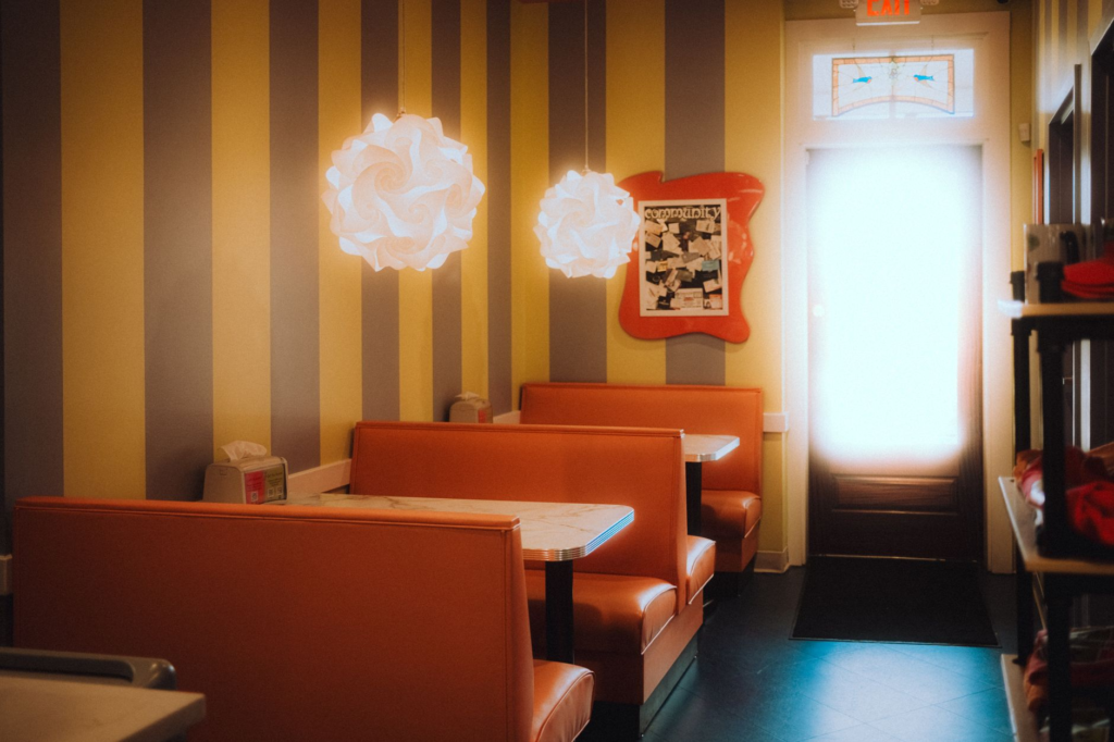An inviting interior of a hidden gem burger restaurant in Las Vegas, showcasing its unique decor. — local favorite burge…