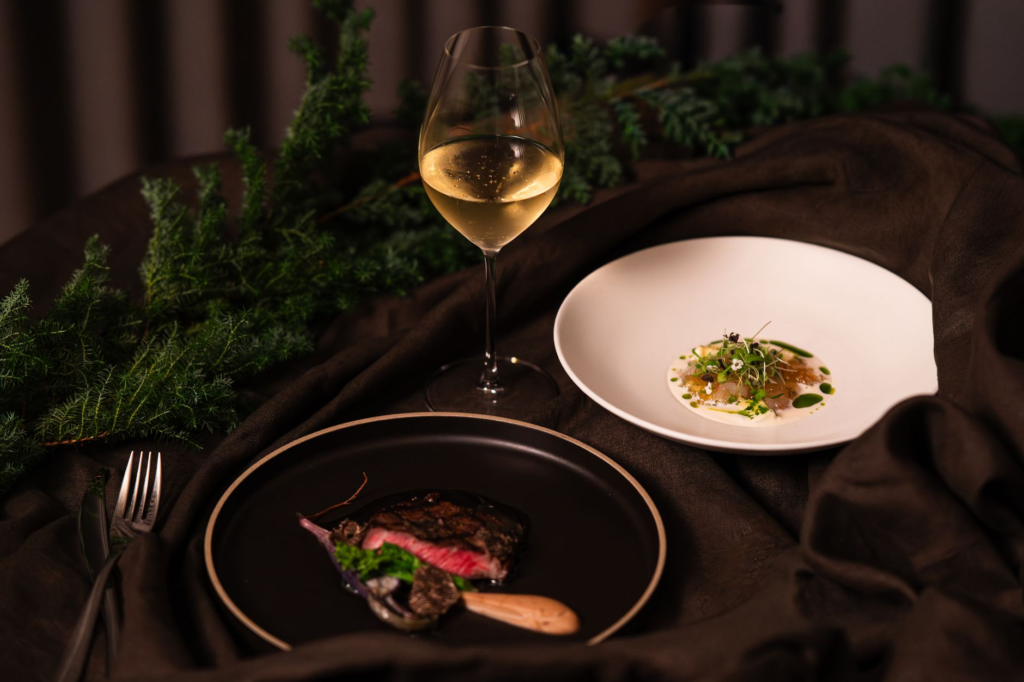 An upscale dining setting featuring luxury burgers on elegant plates with artisan sides. — gourmet burgers las vegas