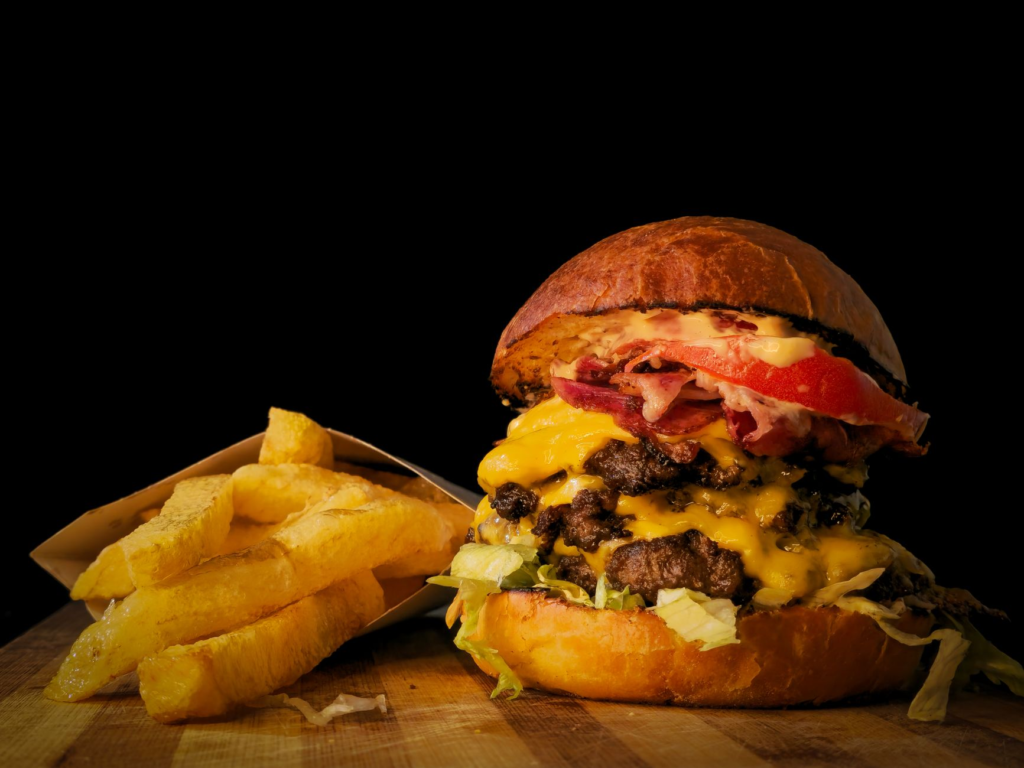 Close-up of a gourmet burger and fries, perfect for late night cravings. — late night burgers las vegas
