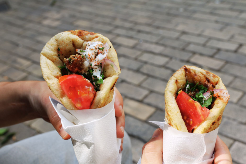A Mediterranean lamb burger served with tzatziki sauce and pita bread. — best burgers in Las Vegas