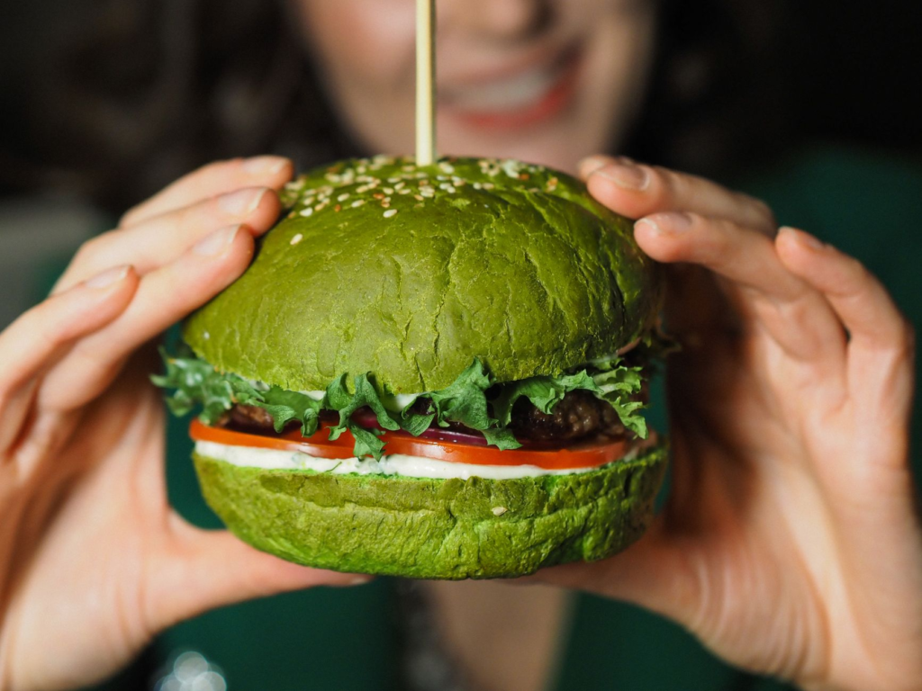 A close-up shot of a gourmet veggie burger with unique toppings. — best vegetarian burgers Las Vegas