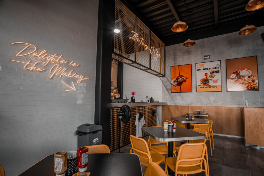 A cozy interior shot of a popular off-the-strip burger restaurant. — local burger spots Las Vegas