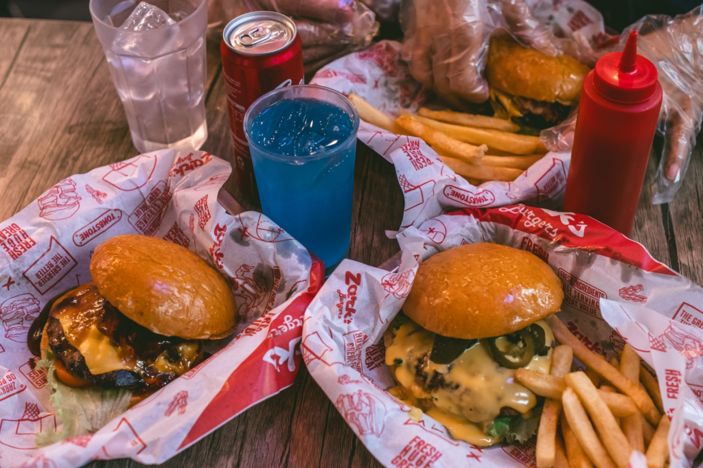 A family enjoying burgers at a local Las Vegas diner. — family-friendly burgers Las Vegas