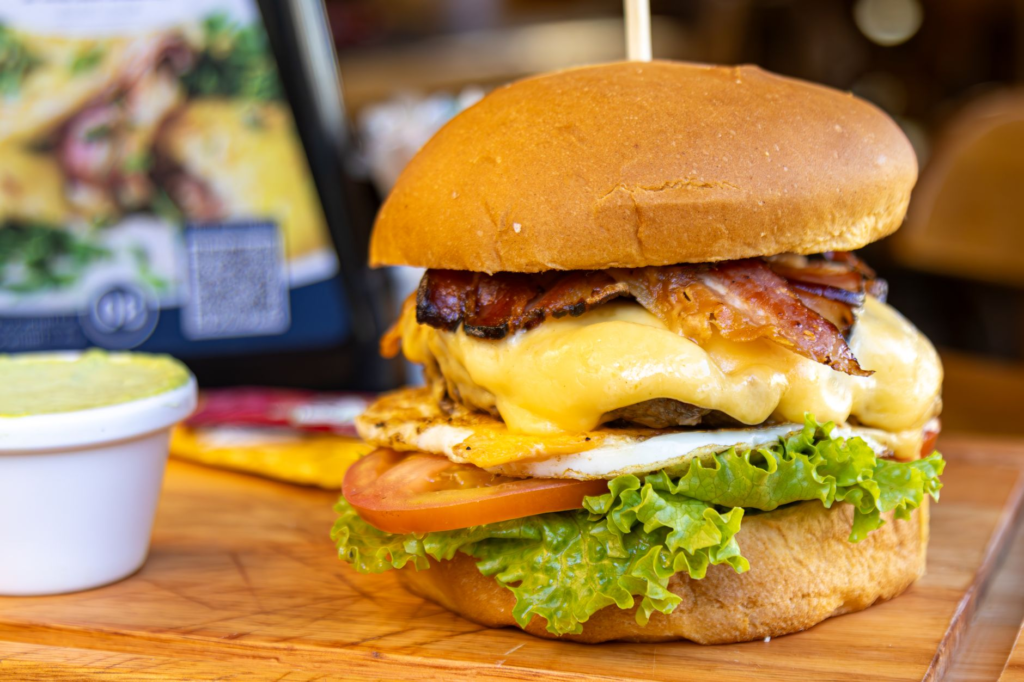 A gourmet burger with fresh toppings served in a Las Vegas restaurant. — las vegas burger faq