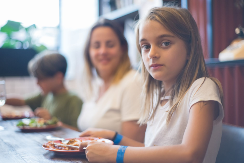 A joyful family enjoying their meal at a kid-friendly restaurant in Las Vegas. — family-friendly burgers Las Vegas