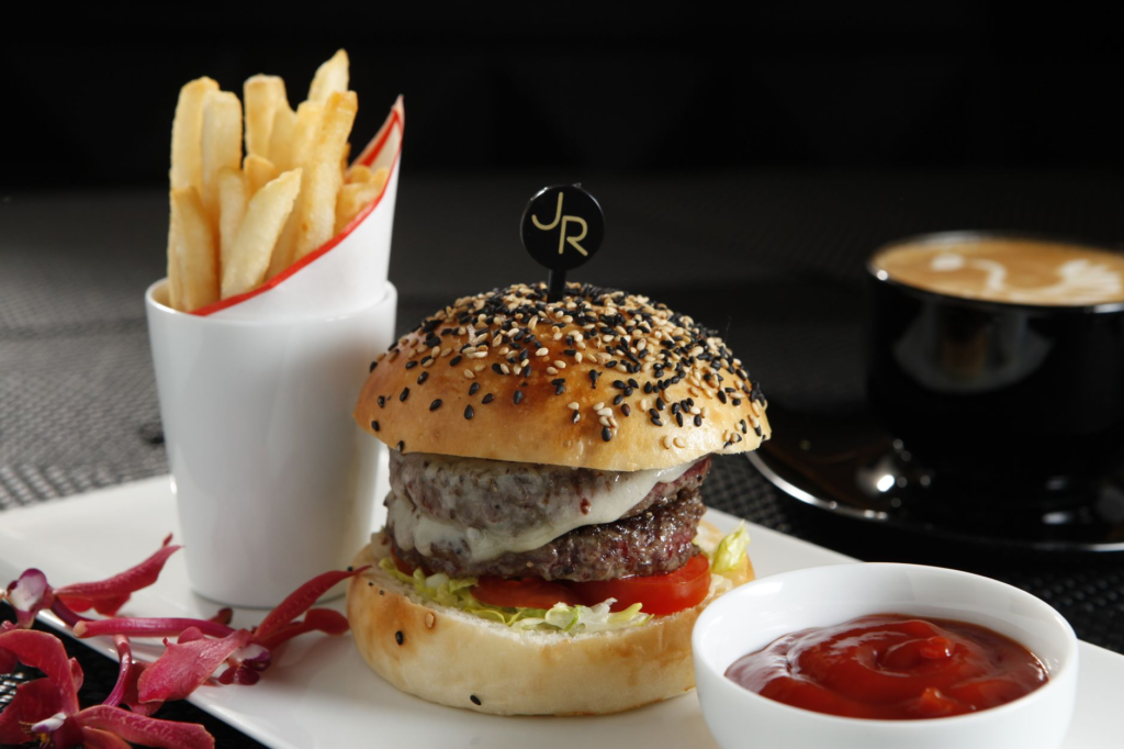 A mouth-watering burger with fries from Gordon Ramsay Burger — burger joints Las Vegas Strip