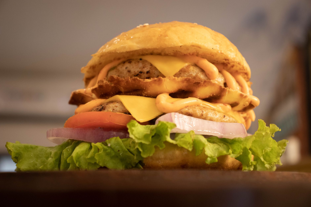 A mouth-watering double cheeseburger with fresh toppings at a popular Las Vegas burger joint. — burger deals Las Vegas