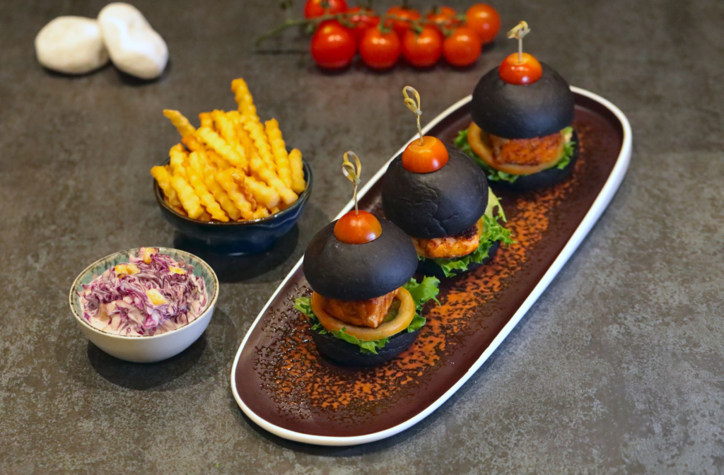 A platter of different veggie burgers showcasing unique ingredients. — vegetarian burgers Las Vegas
