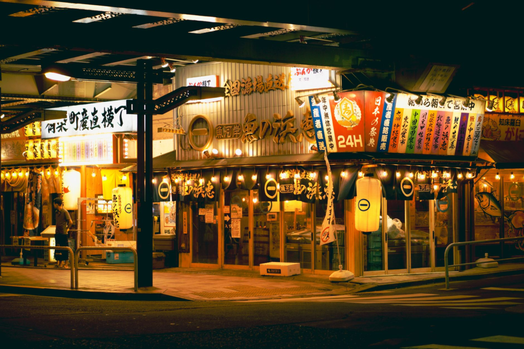 An inviting outdoor seating area of a 24 hour restaurant bustling with late night diners. — 24 hour burgers las vegas