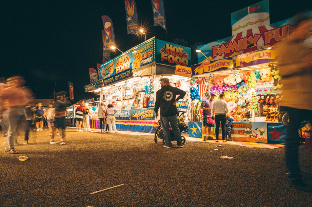 Crowds enjoying a burger festival in Las Vegas, highlighting the festive atmosphere and food booths. — burger festivals …
